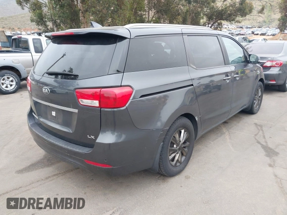 2016 Kia Sedona LX with VIN KNDMB5C11G6200986, listed as a IAAI auction lot 42047368 with 121,376 mi miles. Bid and sale history available at carsss.com. Image 4.