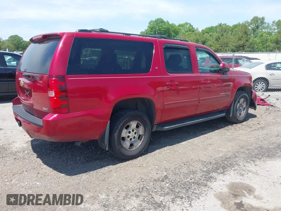 2012 Chevrolet Suburban LT with VIN 1GNSKJE7XCR239853, listed as a IAAI auction lot 42365421 with 283,450 mi miles and . Bid and sale history available at DreamBid. Image 4.