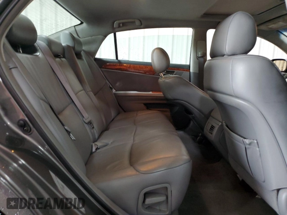 2006 Toyota Avalon XL z VIN 4T1BK36B06U129138, wystawiony jako Copart lot #58068415 z przebiegiem Nie podano mil oraz Szkoda całkowita • Salvage title. Historia ofert i sprzedaży dostępna na DreamBid. Obrazek 10.