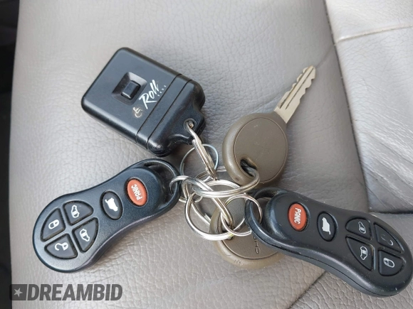 2001 Chrysler Town & Country LXi with VIN 2C8GP54L81R374793, listed as a IAAI auction lot 42150259 with 134,591 mi miles and . Bid and sale history available at DreamBid. Image 11.