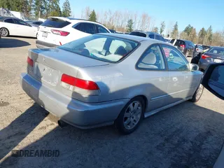 1999 Honda Civic DX with VIN 1HGEJ6120XL034343, listed as a IAAI auction lot 41691134 with 21,882 mi miles. Bid and sale history available at carsss.com. Image 4.