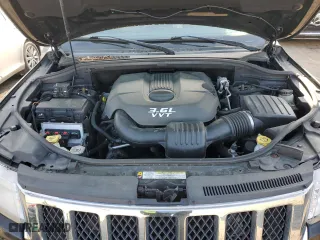 2012 Jeep Grand Cherokee Overland with VIN 1C4RJFCG4CC292383, listed as a Copart auction lot 51168385 with 132,697 mi miles and Salvage Title. Bid and sale history available at carsss.com. Image 12.