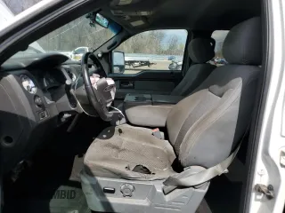2013 Ford F-150 XL with VIN 1FTFW1ET8DKF57962, listed as a Copart auction lot 52625295 with 193,982 mi miles and Salvage Title. Bid and sale history available at carsss.com. Image 7.