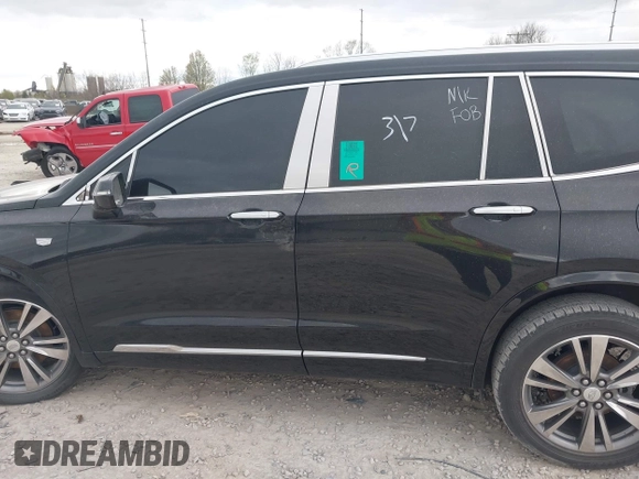 2021 Cadillac XT6 Premium Luxury with VIN 1GYKPDRS2MZ141406, listed as a IAAI auction lot 42014495 with 62,929 mi miles and . Bid and sale history available at DreamBid. Image 15.