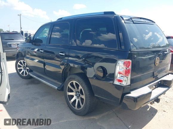 2005 Cadillac Escalade with VIN 1GYEK63N25R248709, listed as a IAAI auction lot 42716039 with 232,349 mi miles and . Bid and sale history available at DreamBid. Image 3.