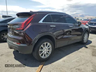 2020 Cadillac XT4 FWD Luxury z VIN 1GYAZAR40LF059910, wystawiony jako Copart lot #55426065 z przebiegiem 36 590 mil mil oraz Szkody całkowita. Historia ofert i sprzedaży dostępna na DreamBid. Obrazek 3.