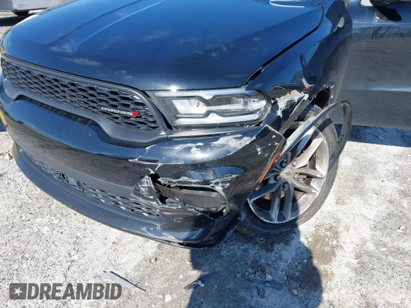 2023 Dodge Durango GT with VIN 1C4RDJDG1PC681982, listed as a IAAI auction lot 41633313 with 53,069 mi miles and . Bid and sale history available at DreamBid. Image 16.