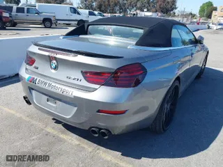 2012 BMW 6 Series 650i with VIN WBALZ3C5XCDL70748, listed as a IAAI auction lot 41762203 with 102,519 mi miles. Bid and sale history available at carsss.com. Image 4.
