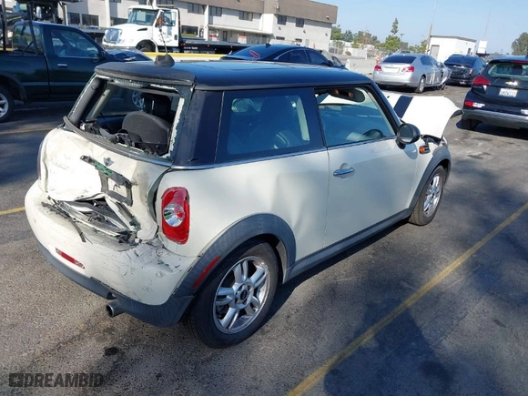 2012 MINI Cooper Hardtop with VIN WMWSU3C53CT258034, listed as a IAAI auction lot 40379259 with 96,370 mi miles. Bid and sale history available at carsss.com. Image 4.