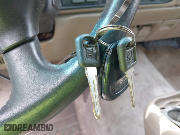 1999 GMC Suburban z VIN 1GKFK16R4XJ798754, wystawiony jako IAAI lot #41998578 z przebiegiem 266 899 mil mil oraz . Historia ofert i sprzedaży dostępna na DreamBid. Obrazek 11.