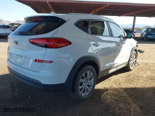 2019 Hyundai Tucson Value with VIN KM8J33A49KU979927, listed as a IAAI auction lot 41818355 with 96,208 mi miles. Bid and sale history available at carsss.com. Image 4.