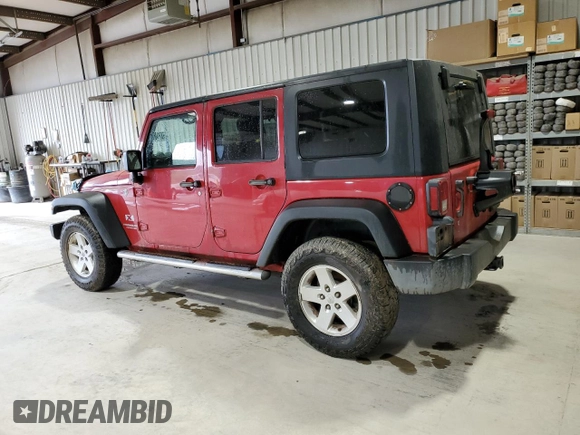 2008 Jeep Wrangler Unlimited X with VIN 1J8GA39128L645762, listed as a Copart auction lot 57888345 with 205,178 mi miles and Salvage title. Bid and sale history available at DreamBid. Image 2.