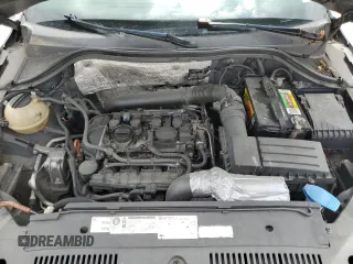 2012 Volkswagen Tiguan SE z VIN WVGAV7AX4CW001417, wystawiony jako Copart lot #61105865 z przebiegiem 168 110 mil mil oraz Czysty tytuł • Clean title. Historia ofert i sprzedaży dostępna na DreamBid. Obrazek 11.