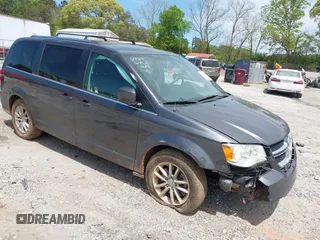 2018 Dodge Grand Caravan SXT z VIN 2C4RDGCG4JR206720, wystawiony jako IAAI lot #42050492 z przebiegiem 148 270 mil mil oraz . Historia ofert i sprzedaży dostępna na DreamBid. Obrazek 1.