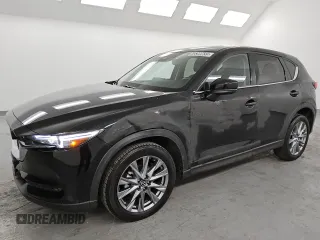 2021 Mazda CX-5 Grand Touring with VIN JM3KFBDM6M0487606, listed as a Copart auction lot 45399655 with 25,241 mi miles and Clean Title. Bid and sale history available at DreamBid. Image 1.