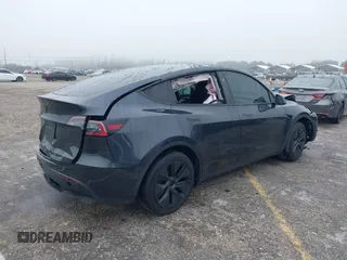 2024 Tesla Model Y with VIN 7SAYGDED8RF213927, listed as a IAAI auction lot 41386687 with 3,599 mi miles and . Bid and sale history available at DreamBid. Image 4.