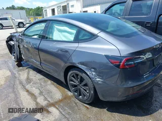 2023 Tesla Model 3 z VIN 5YJ3E1EA7PF413311, wystawiony jako IAAI lot #42442055 z przebiegiem 25 270 mil mil oraz . Historia ofert i sprzedaży dostępna na DreamBid. Obrazek 3.