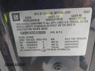 2007 GMC Acadia SLE with VIN 1GKER13727J120059, listed as a IAAI auction lot 41238215 with 218,415 mi miles. Bid and sale history available at carsss.com. Image 9.