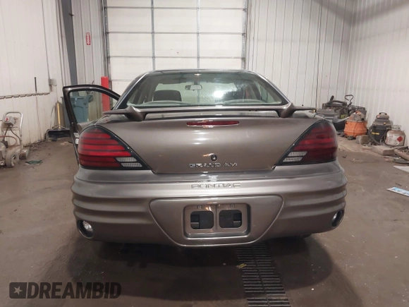 2002 Pontiac Grand Am SE1 z VIN 1G2NF52FX2C128240, wystawiony jako IAAI lot #41356415 z przebiegiem 15 900 mil mil oraz . Historia ofert i sprzedaży dostępna na DreamBid. Obrazek 16.