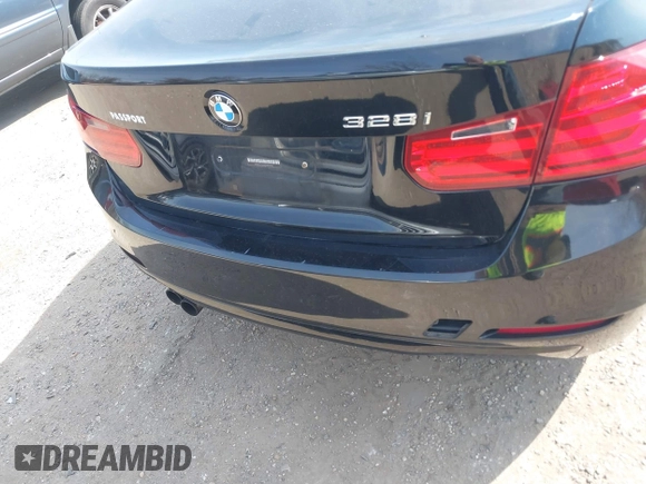 2013 BMW 3 Series 328i with VIN WBA3C1G53DNR44943, listed as a IAAI auction lot 41769496 with 131,700 mi miles and . Bid and sale history available at carsss.com. Image 6.
