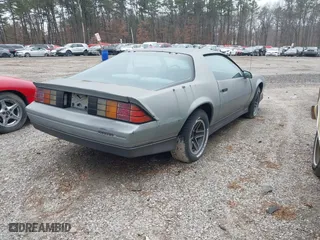 1985 Chevrolet Camaro Z28 Sport with VIN 1G1FP87HXFL442512, listed as a IAAI auction lot 41387610 with 136,000 mi miles. Bid and sale history available at carsss.com. Image 4.