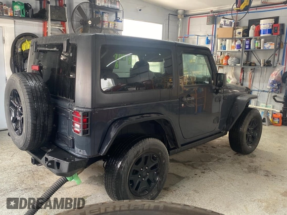 2017 Jeep Wrangler Willys Wheeler with VIN 1C4AJWAGXHL602088, listed as a Copart auction lot 45524745 with 101,847 mi miles and Clean Title. Bid and sale history available at DreamBid. Image 4.