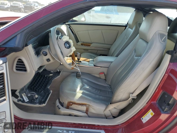 2006 Cadillac XLR z VIN 1G6YV36A765600678, wystawiony jako Copart lot #88111045 z przebiegiem 46 257 mil mil oraz Nie do naprawy • Non repairable. Historia ofert i sprzedaży dostępna na DreamBid. Obrazek 7.