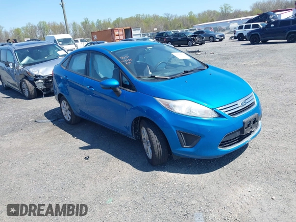 2012 Ford Fiesta SE with VIN 3FADP4BJXCM125881, listed as a IAAI auction lot 42044455 with 156,804 mi miles. Bid and sale history available at carsss.com. Image 1.