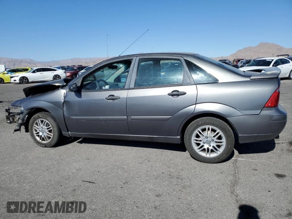 2007 Ford Focus S z VIN 1FAFP34NX7W321313, wystawiony jako Copart lot #43158235 z przebiegiem 57 299 mil mil oraz Szkoda całkowita • Salvage title. Historia ofert i sprzedaży dostępna na DreamBid. Obrazek 2.