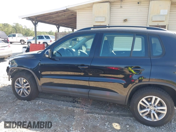 2017 Volkswagen Tiguan S with VIN WVGAV7AX7HK021496, listed as a IAAI auction lot 41968240 with 142,980 mi miles and . Bid and sale history available at DreamBid. Image 14.