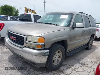 2002 GMC Yukon SLT z VIN 1GKEC13Z02R199471, wystawiony jako IAAI lot #42379318 z przebiegiem 212 157 mil mil oraz . Historia ofert i sprzedaży dostępna na DreamBid. Obrazek 2.