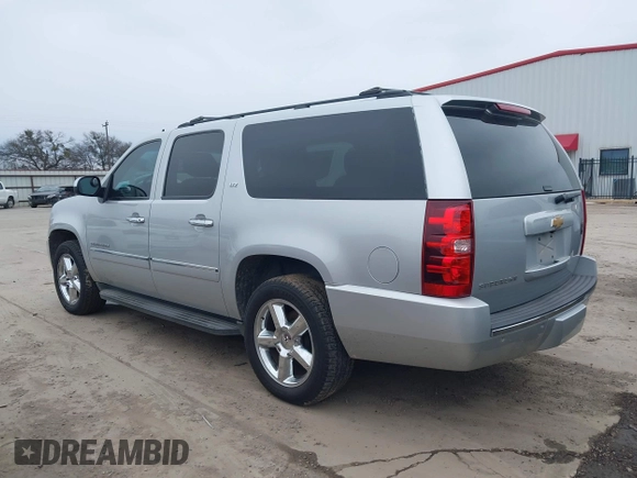 2013 Chevrolet Suburban LTZ with VIN 1GNSCKE02DR369777, listed as a IAAI auction lot 41565371 with 205,768 mi miles and . Bid and sale history available at DreamBid. Image 14.