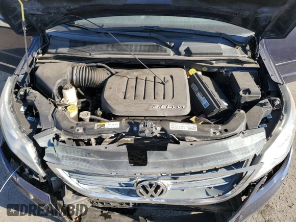 2014 Volkswagen Routan SE with VIN 2C4RVABG7ER134462, listed as a Copart auction lot 76492444 with 93,373 mi miles and Salvage title. Bid and sale history available at DreamBid. Image 12.