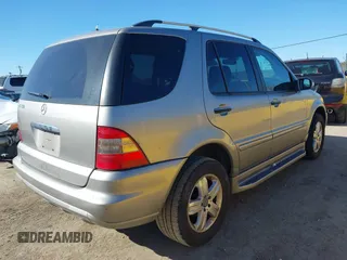 2005 Mercedes-Benz M 350 with VIN 4JGAB57E65A550801, listed as a IAAI auction lot 41669539 with 207,572 mi miles and . Bid and sale history available at DreamBid. Image 4.