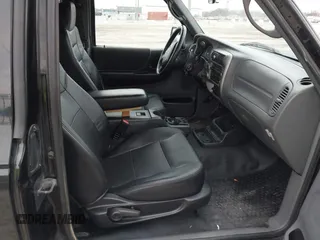 2009 Ford Ranger XLT with VIN 1FTZR45E39PA27500, listed as a IAAI auction lot 41712566 with 232,654 mi miles. Bid and sale history available at carsss.com. Image 5.