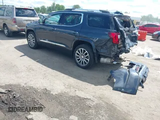 2022 GMC Acadia Denali with VIN 1GKKNXLS0NZ168843, listed as a IAAI auction lot 42322489 with 30,293 mi miles and . Bid and sale history available at DreamBid. Image 3.