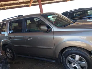 2011 Honda Pilot EX with VIN 5FNYF3H4XBB028225, listed as a IAAI auction lot 41873192 with 155,556 mi miles and . Bid and sale history available at carsss.com. Image 13.