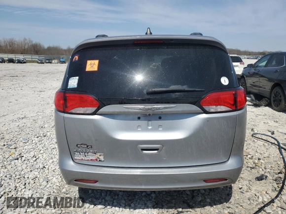 2021 Chrysler Voyager LXi z VIN 2C4RC1DG0MR537880, wystawiony jako Copart lot #52865575 z przebiegiem 82 492 mil mil oraz Nie do naprawy • Non repairable. Historia ofert i sprzedaży dostępna na DreamBid. Obrazek 6.