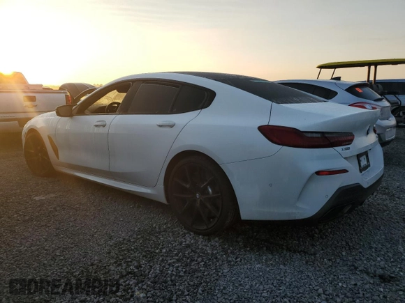 2023 BMW 8 Series M850i z VIN WBAGV8C0XPCL58173, wystawiony jako Copart lot #76322394 z przebiegiem 24 954 mil mil oraz Nie do naprawy • Non repairable. Historia ofert i sprzedaży dostępna na DreamBid. Obrazek 2.