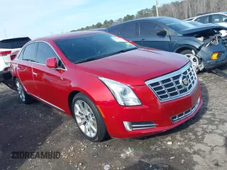 2015 Cadillac XTS Luxury z VIN 2G61M5S33F9170531, wystawiony jako IAAI lot #41309422 z przebiegiem 28 709 mil mil oraz . Historia ofert i sprzedaży dostępna na DreamBid. Obrazek 1.