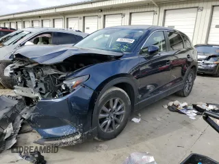 2019 Mazda CX-9 Sport с VIN JM3TCABY2K0321285, выставлен на аукционе Copart как лот 85372004 с пробегом 57 423 миль миль и Списание • Salvage title. История ставок и продаж доступна на DreamBid. Изображение 1.