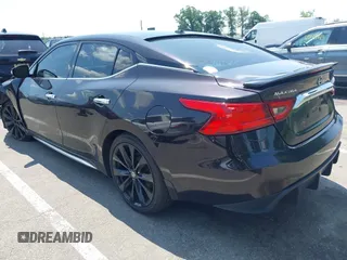 2016 Nissan Maxima SL with VIN 1N4AA6AP5GC393122, listed as a IAAI auction lot 42523884 with 116,659 mi miles and . Bid and sale history available at DreamBid. Image 3.