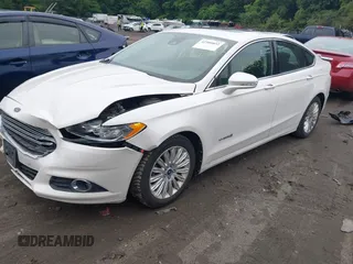 2013 Ford Fusion SE Hybrid with VIN 3FA6P0LU0DR128688, listed as a IAAI auction lot 42580852 with 137,421 mi miles and . Bid and sale history available at DreamBid. Image 2.