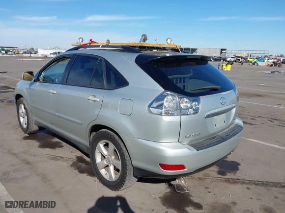 2005 Lexus RX 330 with VIN 2T2GA31U05C027884, listed as a IAAI auction lot 40676404 with 235,915 mi miles. Bid and sale history available at carsss.com. Image 3.