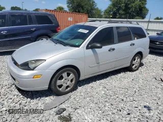 2004 Ford Focus ZTW with VIN 1FAFP35Z44W140558, listed as a Copart auction lot 55385065 with 202,432 mi miles and Salvage title. Bid and sale history available at DreamBid. Image 1.