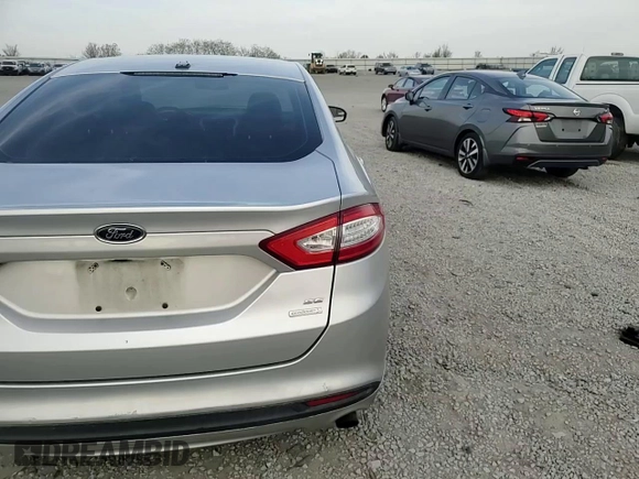 2013 Ford Fusion SE with VIN 3FA6P0HR3DR310633, listed as a Copart auction lot 52946725 with 105,056 mi miles and Salvage title. Bid and sale history available at DreamBid. Image 11.