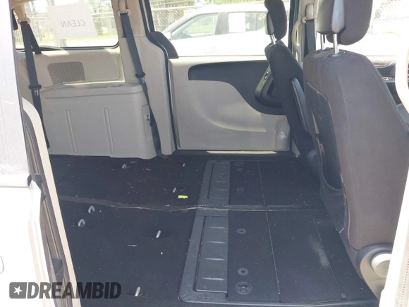 2013 Dodge Grand Caravan SE with VIN 2C4RDGBG0DR702913, listed as a IAAI auction lot 42007786 with 163,981 mi miles and . Bid and sale history available at DreamBid. Image 8.
