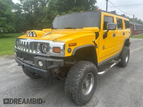 2003 Hummer H2 z VIN 5GRGN23U53H141743, wystawiony jako Copart lot #60153185 z przebiegiem 137 863 mil mil oraz Czysty tytuł • Clean title. Historia ofert i sprzedaży dostępna na DreamBid. Obrazek 2.