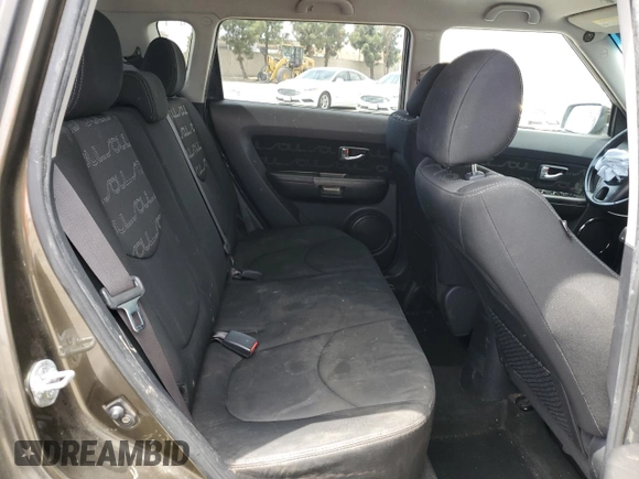 2013 Kia Soul + z VIN KNDJT2A62D7532020, wystawiony jako Copart lot #55184065 z przebiegiem 177 074 mil mil oraz Szkoda całkowita • Salvage title. Historia ofert i sprzedaży dostępna na DreamBid. Obrazek 11.