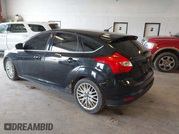 2012 Ford Focus SEL with VIN 1FAHP3M24CL331586, listed as a IAAI auction lot 42086129 with 193,060 mi miles. Bid and sale history available at carsss.com. Image 3.